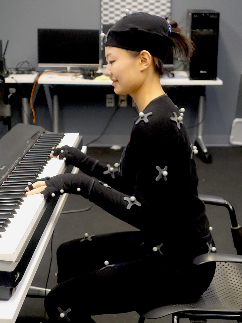 Qiu Yi (Chewy) recording a keyboard performance
