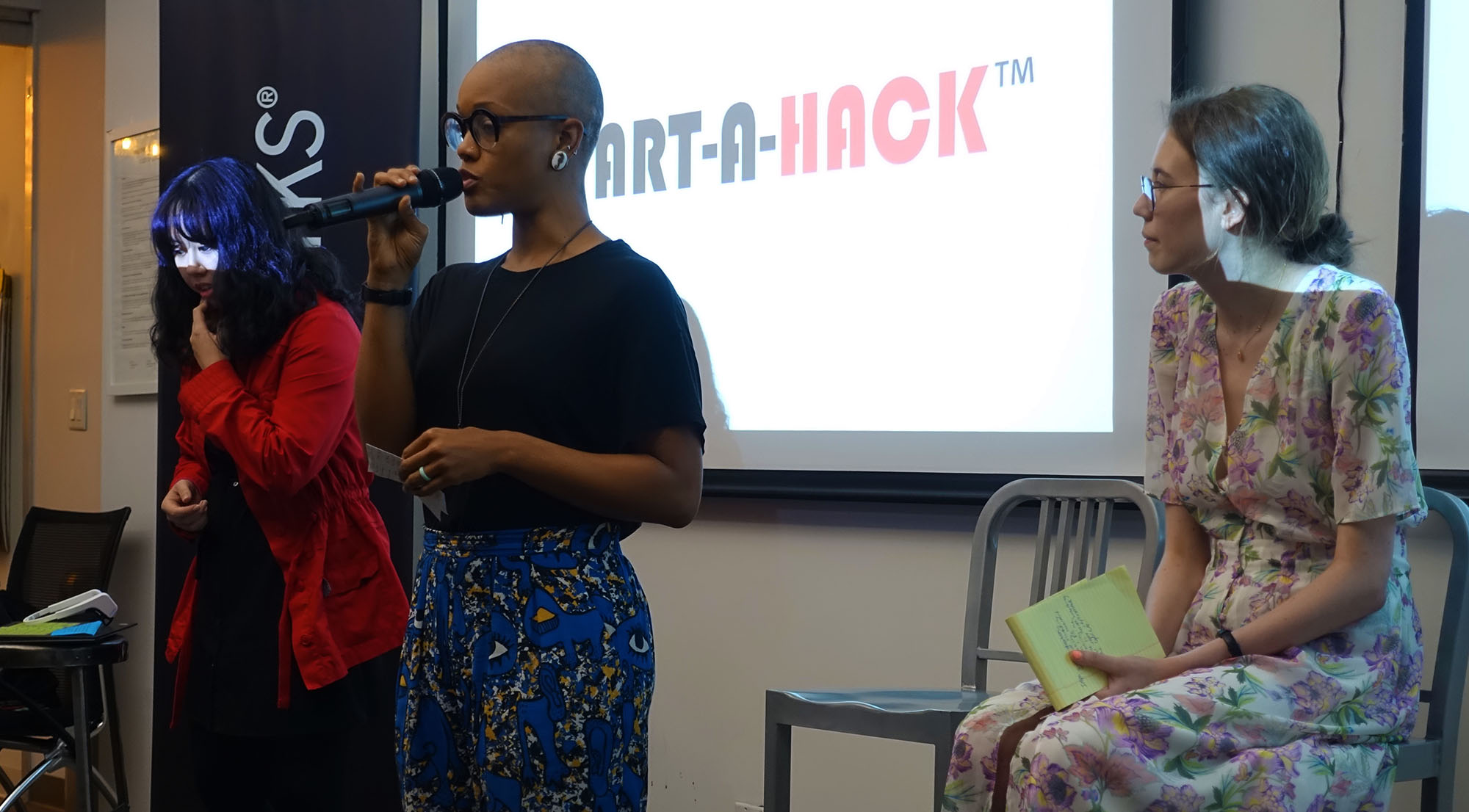 The team performing during the Art-A-Hack final presentation
